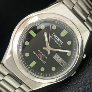 Vintage 1974 Orient Automatic Mens Silver Watch W/daydate & Green accents